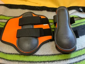 NEW! Gallop orange patent brushing boots. Full size. FREE DELIVERY